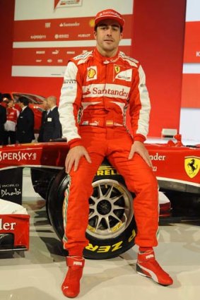 Fond farewell ... Fernando Alonso with the Ferrari F138, named for the year and eighth and last season of V8s.
