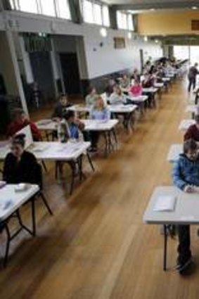 Warrnambool College Year 12 VCE students wait as their VCE English exams are collected.
