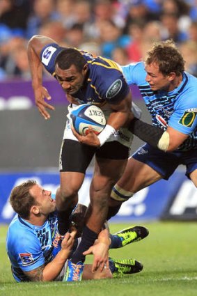 Tevita Kuridrani takes on the Bulls' defence on Sunday morning.