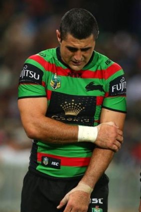 Bryson Goodwin of the Rabbitohs leaves the field after injurying his arm.