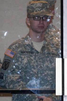 Bradley Manning in  handcuffs.