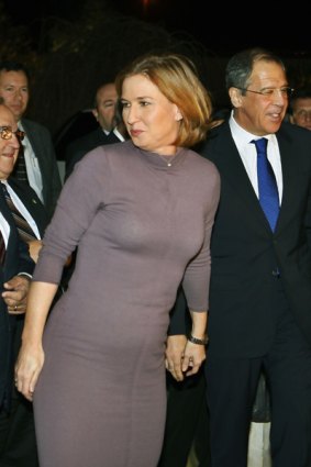 Israel's Foreign Minister Tzipi Livni walks with her Russian counterpart Sergei Lavrov (right) before their meeting in Jerusalem.