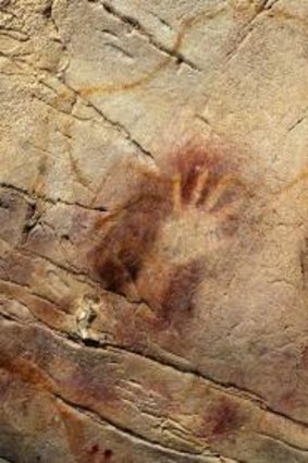 Book one: Panel of Hands, El Castillo Cave, Spain. 