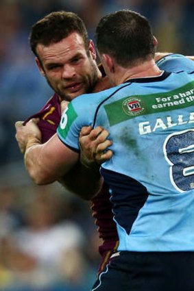 The punch which started it all ... Paul Gallen lands one on the chin of Nate Myles during Origin.