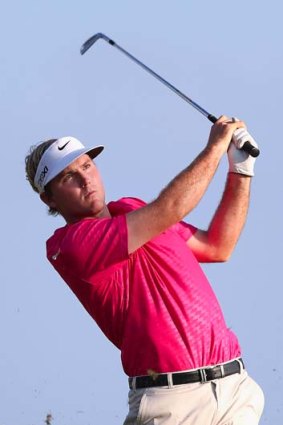 Russell Henley hits a tee shot on the 17th hole during the final round of the Sony Open in Hawaii.