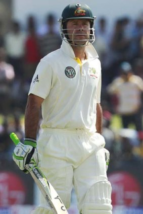 Ricky Ponting walks off the field after his second innings dismissal.