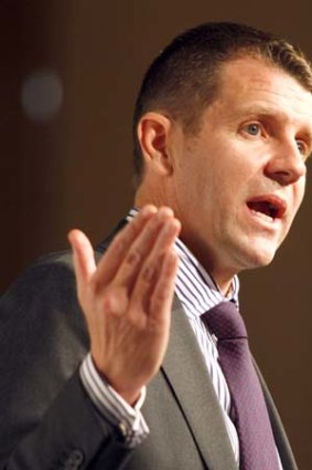 Played down the need for emergency budget measures ... state Treasurer Mike Baird.