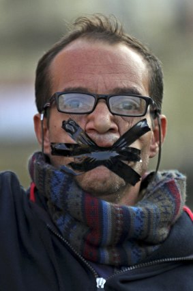 An Egyptian man reacts to Hosni Mubarak's acquittal on charges of ordering the killing of protesters.