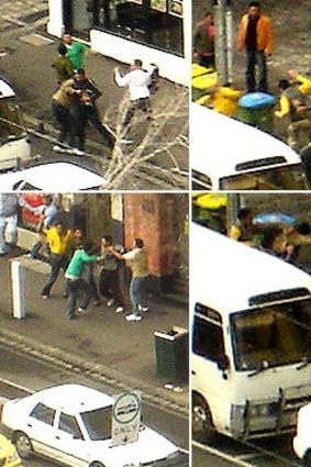 Street brawl ... an office worker snapped photos of a mid-afternoon brawl in Swanston Street.
