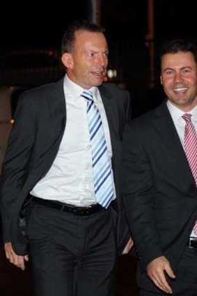 Optimism ... Josh Frydenberg, pictured right with Tony Abbott.