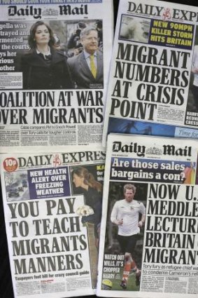 Recent editions of Britain's Daily Express and Daily Mail newspapers, featuring headlines about immigration.