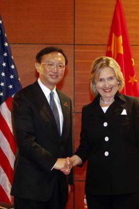 US Secretary of State Hilary Clinton shakes hands with China's Foreign Minister Yang Jiechi.