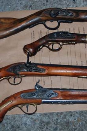 Police found a number of weapons at the home of the man who was allegedly driving the ute which hit Richard Warburton.