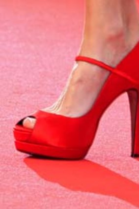 The shoes of actress Frederique Bel as she arrives on the red carpet for the screening of Habemus Papam (We Have A Pope) at the Cannes Film Festival.