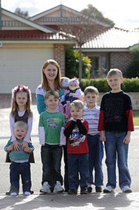 Careful planning ... Cassandra Parker and baby Bella with (from left) Paige, 7, Bailey, 18 months, Zachary, 8, Andy, 3, Brady, 5, and Sam, 10.