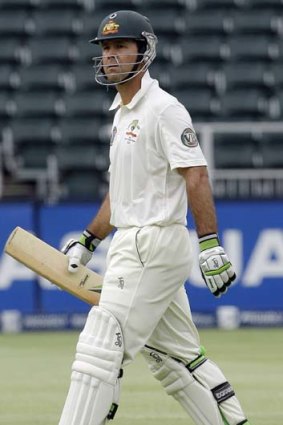On his way ... Australian batsman Ricky Ponting leaves the field after being dismissed for 62.