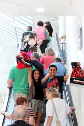 Maddie Cardonne and Joseph Sorrentino, of Yarralumla, spend their Christmas gift money at the Canberra Centre.