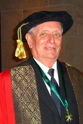 Man of many hats ... Taylor in academic garb for a Southern Pacific University graduation ceremony.