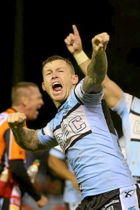 Todd Carney celebrates at the whistle.