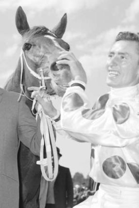 Soft spot: Higgins with Light Fingers after the 1965 Melbourne Cup.