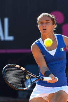 Italy's Sara Errani returns service to Russia's Alisa Kleybanova during their Fed Cup match in Cagliari on Sunday.