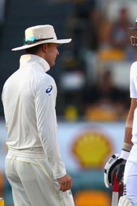 Copping it: Michael Clarke gives James Anderson a dose of his own medicine.