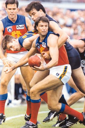 Paul Roos, pictured here playing for the Fitzroy Lions in 1993, is a favourite to return to his old club as coach.