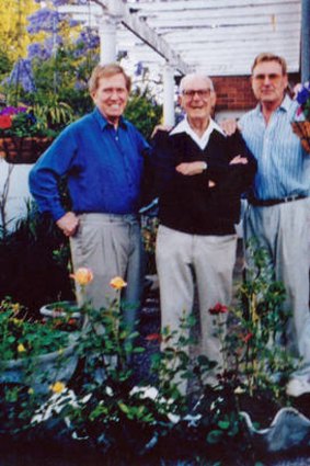 Michael Kirby with his father Don and partner Johan van Vloten at their Sydney house in 2002.