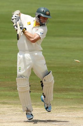Chris Rogers plays the ball onto his stumps to go out for 1.