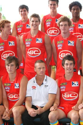Gold Coast coach Guy McKenna with his charges.