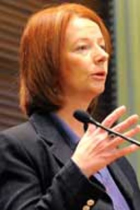 "[The government] will not succumb to threats...Julia Gillard.