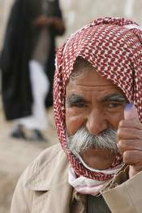A man shows his election-ink stained finger after voting in Sinjar, 390 kilometres north-west of Baghdad, in 2009.