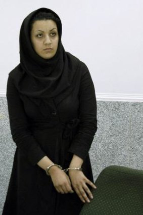 Hanged: Reyhaneh Jabbari handcuffed at police headquarters after her arrest in 2007. 
