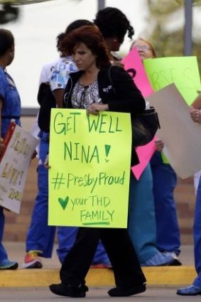 Some relief: Staff at Texas Health Presbyterian Hospital demonstrate in support of their infected colleagues last week.