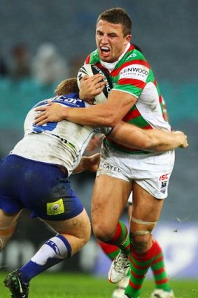 Body blow ... Sam Burgess is back on the sidelines.
