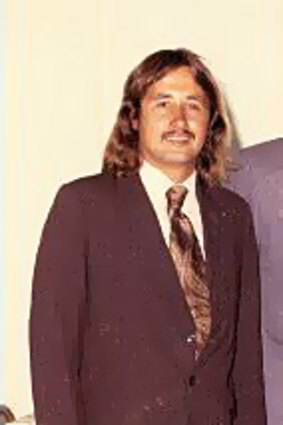 A young Wayne Swan, with moustache.