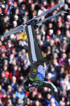 Jacqui Cooper performs in the women's freestyle skiing aerials qualifications.
