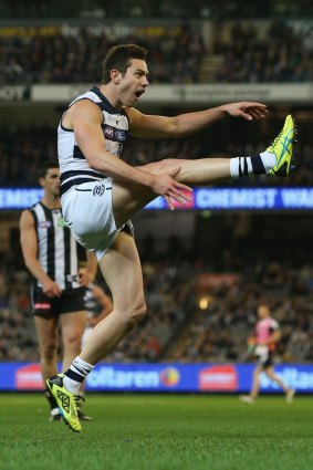 Daniel Menzel boots for goal in the first quarter.