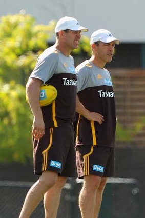 Hawthorn's assistant coach Brett Ratten and coach Alastair Clarkson look on during a training session at Waverley Park last week.