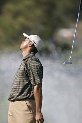 Old Tiger ... Woods tosses his putter during the Accenture Match Play Championship at La Costa, California in 2006.