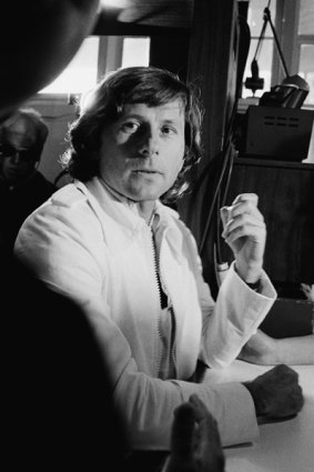 Movie director Roman Polanski talks with correctional officers in this December 17, 1977 file photo taken at Chino Mens Institute in Chino, California.