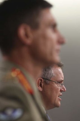 Immigration Minister Scott Morrison and Operation Sovereign Borders Commander, Lieutenant General Angus Campbell defended the government's secrecy on asylum seekers on Friday.