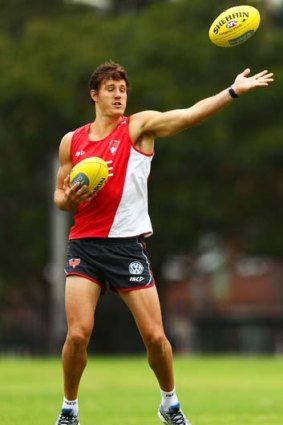 Kurt Tippett completes a skills drill during a training session at Lakeside Oval on Tuesday.