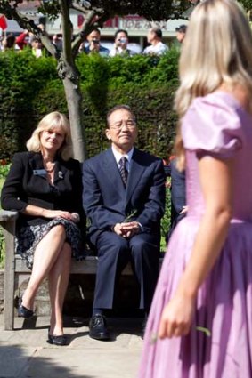 Chinese Premier Wen Jiabao looks on as actresses perform Hamlet during a visit to Shakespeare's birthplace in Stratford-upon-Avon.