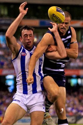 Off the boil: North's Todd Goldstein battles Geelong's Trent West.
