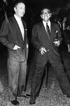 Tom Critchley at an Australia Day party in 1962 with Malaysia's prime minister, Tunku Abdul Rahman.