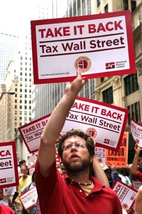 Workers converge on Wall Street to protest against financial intuitions and inequality.
