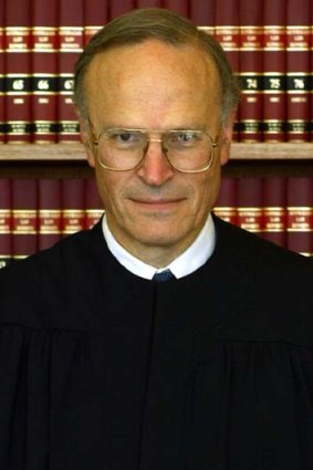 Different strokes... Justice John Dyson Heydon working in his chambers at the Supreme court in Sydney, after being appointed to the High Court.