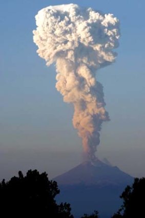 Popocatepetl Volcano spits out a cloud of ash and steam in Mexico.