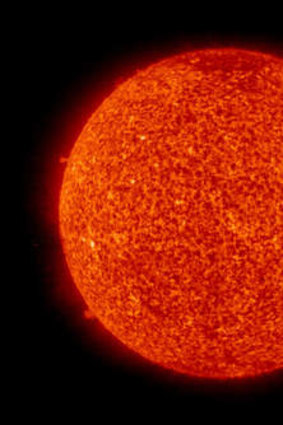 Quiet year: An image from NASA's Solar and Heliospheric Observatory showing a new sunspot, upper right, in 2008.